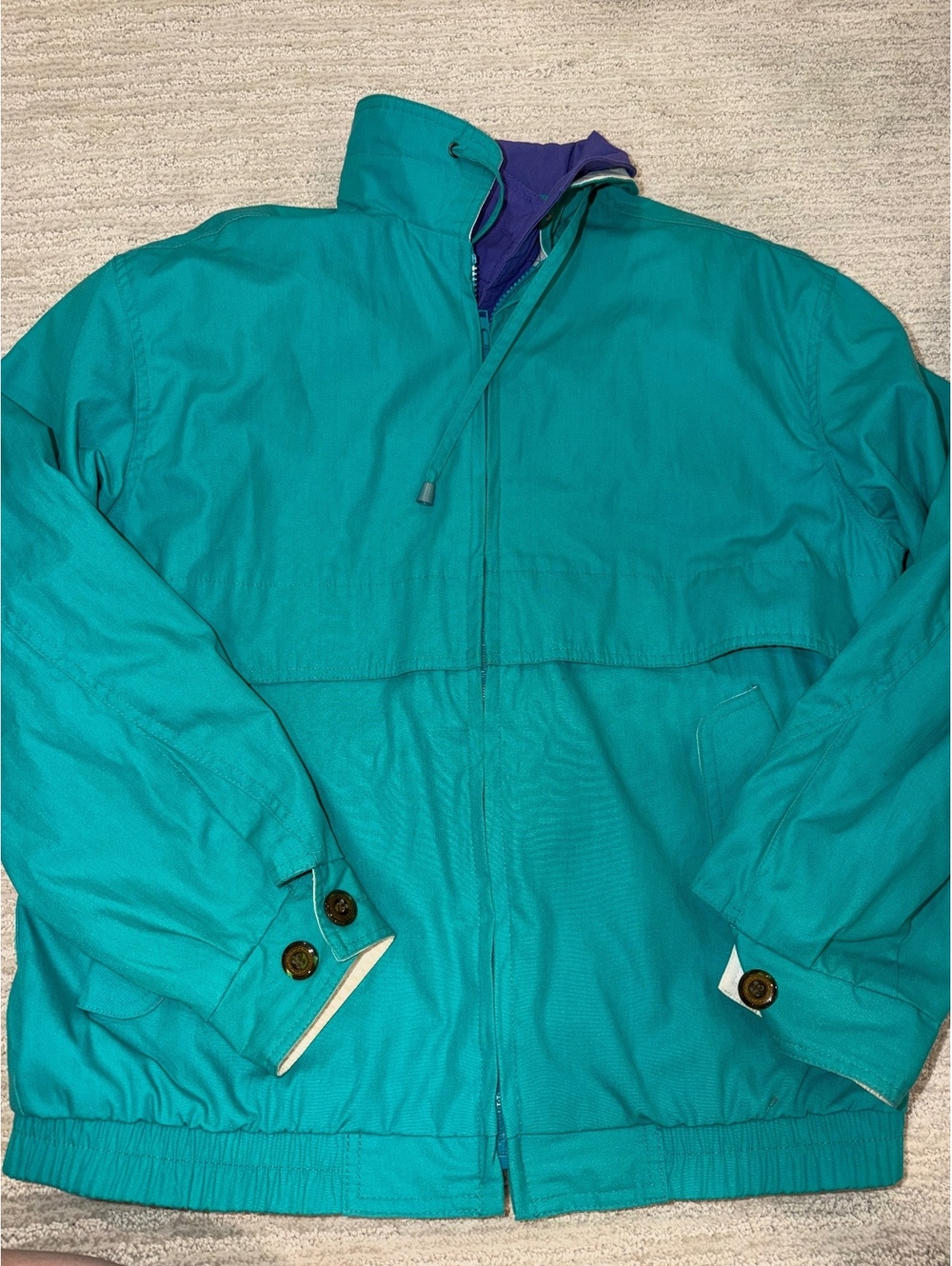 Amanda Smith teal and purple jacket